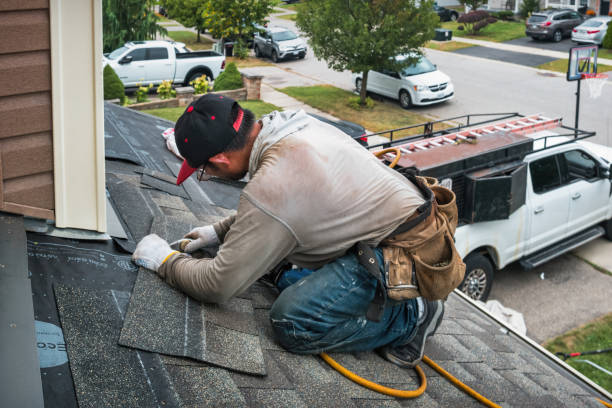 Professional Gutter Repair And Installation technician working in Fishers, NY